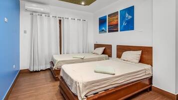 2 habitaciones, wifi gratis y ropa de cama