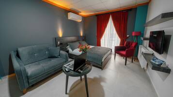 Chambre Deluxe | Coffres-forts dans les chambres, rideaux occultants