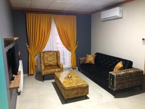 Suite, City View (1+1) | Living room | LCD TV