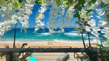 On the beach, sun loungers, beach towels