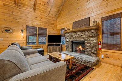 Peaceful dog-friendly cabin with private hot tub, firepit, & deck
