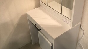 A small, white desk with a mirror and a drawer. - Oval Tokyo Ikesan 101 (Tokyo)