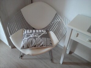 A chair with a cushion that reads "Young & Free HOME." - Studio apartment in Hvar town with Terrace, Air condition, WIFI (4858-4) (Hvar)