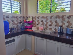 Fridge, stovetop, rice cooker, cookware/dishes/utensils