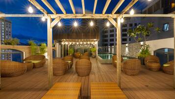 Outdoor pool, open 6:00 AM to 7:00 PM, pool umbrellas, pool loungers