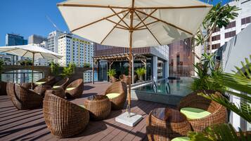 Outdoor pool, open 6:00 AM to 7:00 PM, pool umbrellas, pool loungers