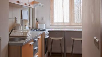 Microwave, coffee/tea maker, cookware/dishes/utensils, spices