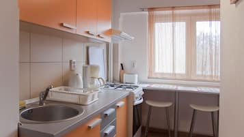 Microwave, coffee/tea maker, cookware/dishes/utensils, spices