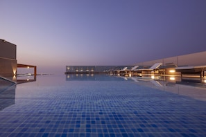 Outdoor pool, open 7:00 AM to 8:00 PM, pool umbrellas, sun loungers