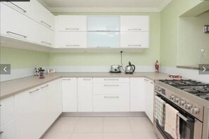 Condo (Ocean) | Private kitchen | Fridge, microwave, oven, stovetop