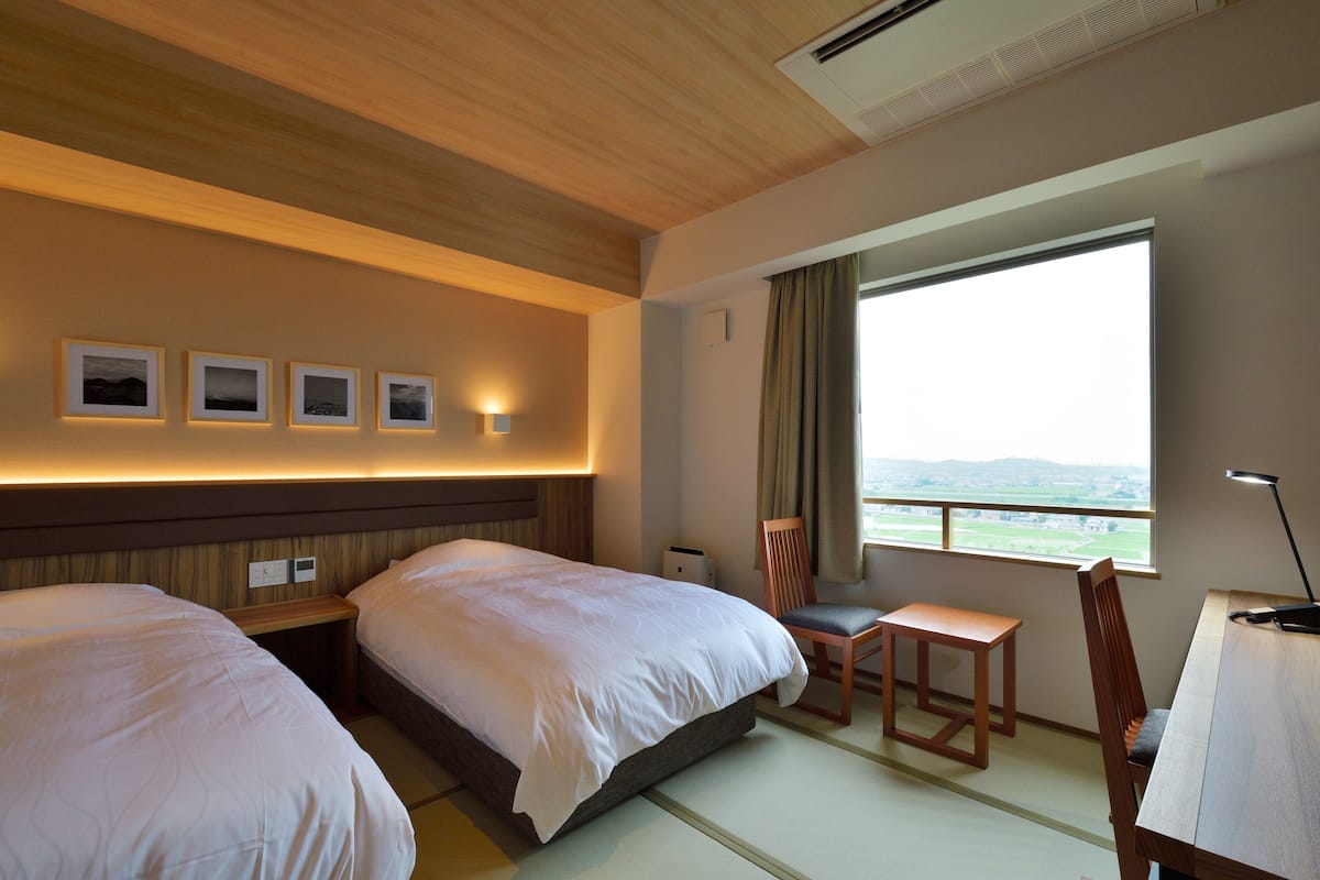 Standard Twin Room | 1 bedroom, down comforters, in-room safe, individually decorated