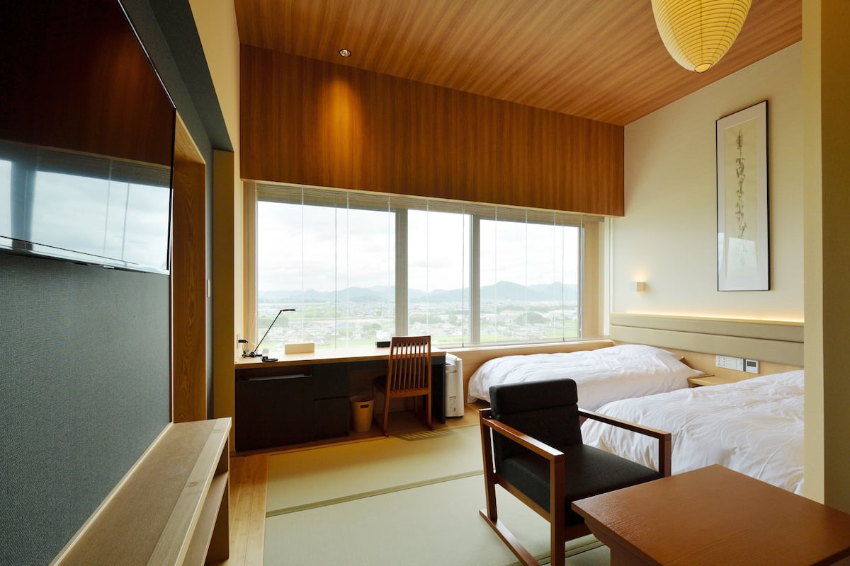 Deluxe Twin Room | 1 bedroom, down comforters, in-room safe, individually decorated