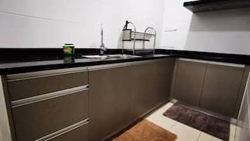 Fridge, stovetop, electric kettle, toaster