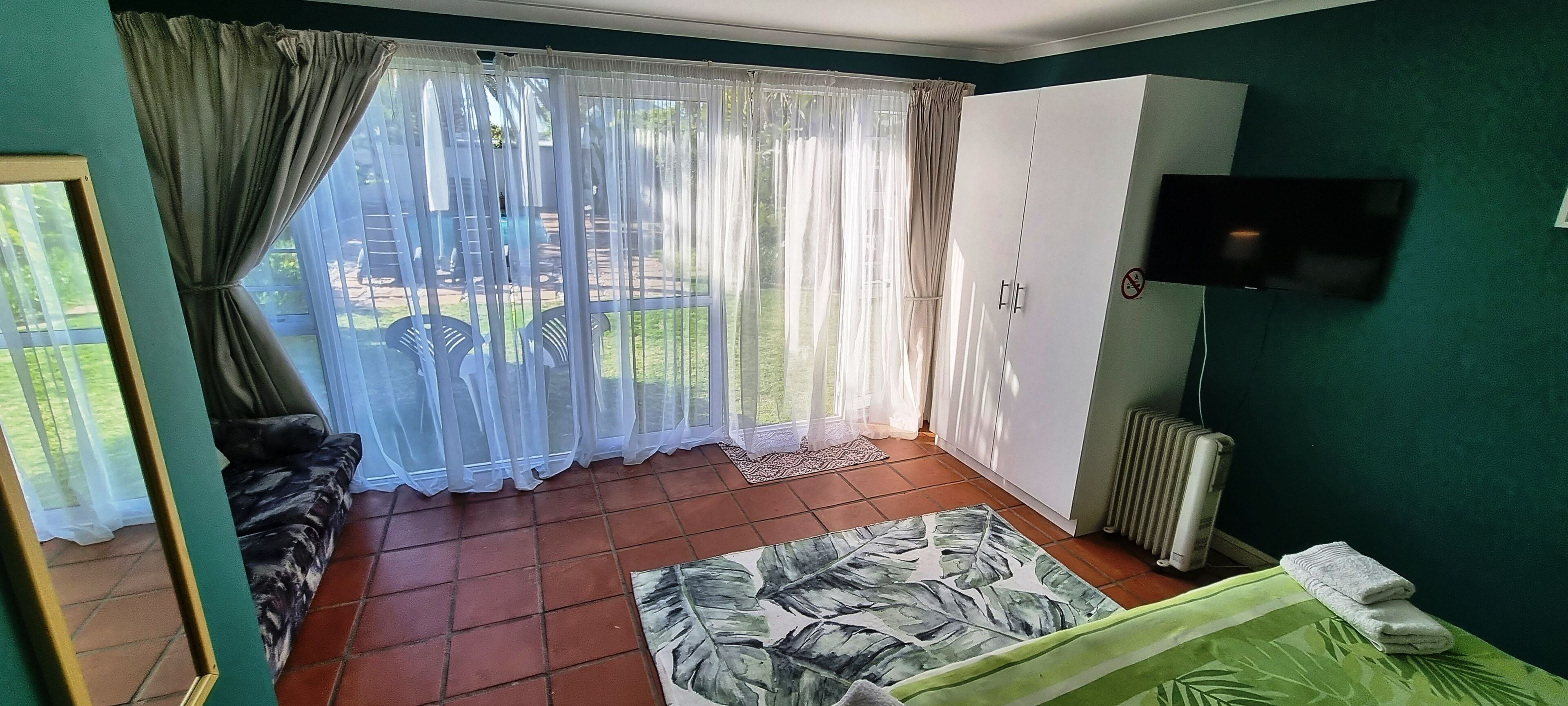 Double Room | Blackout drapes, iron/ironing board, bed sheets