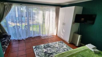 Double Room | Blackout drapes, iron/ironing board, bed sheets