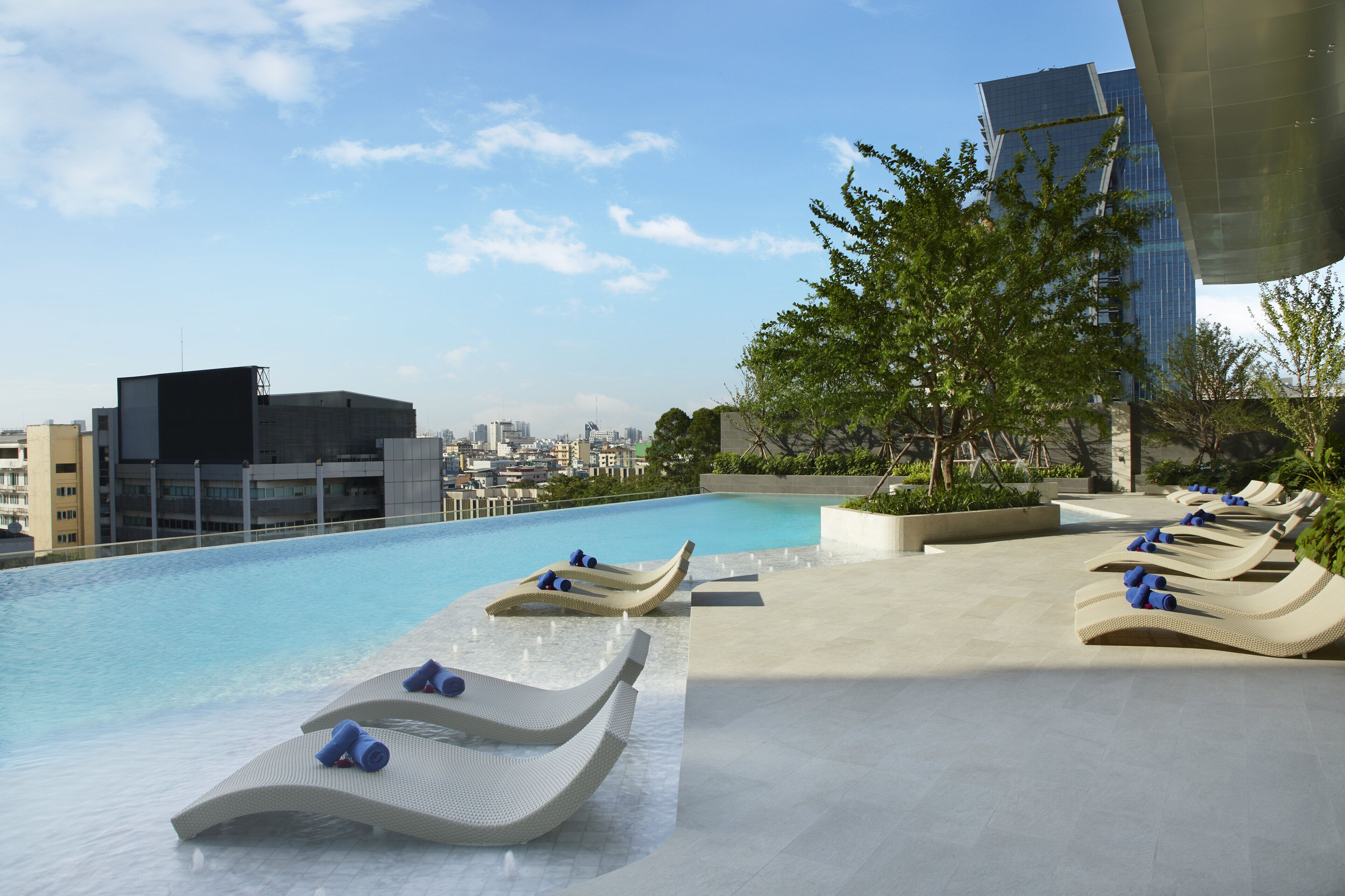 outdoor pool, open 6:00 am to 10:00 pm, pool loungers