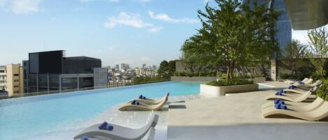 Outdoor pool, open 6:00 AM to 10:00 PM, sun loungers