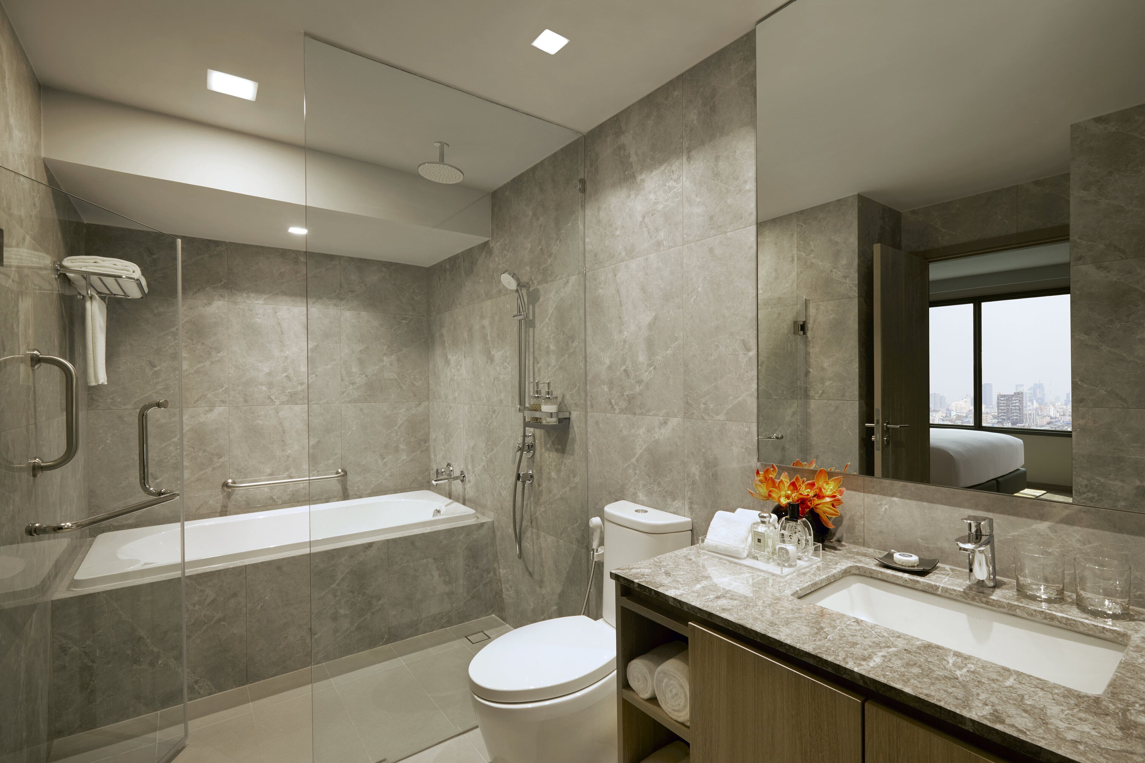 eco-friendly toiletries, hair dryer, bathrobes, slippers