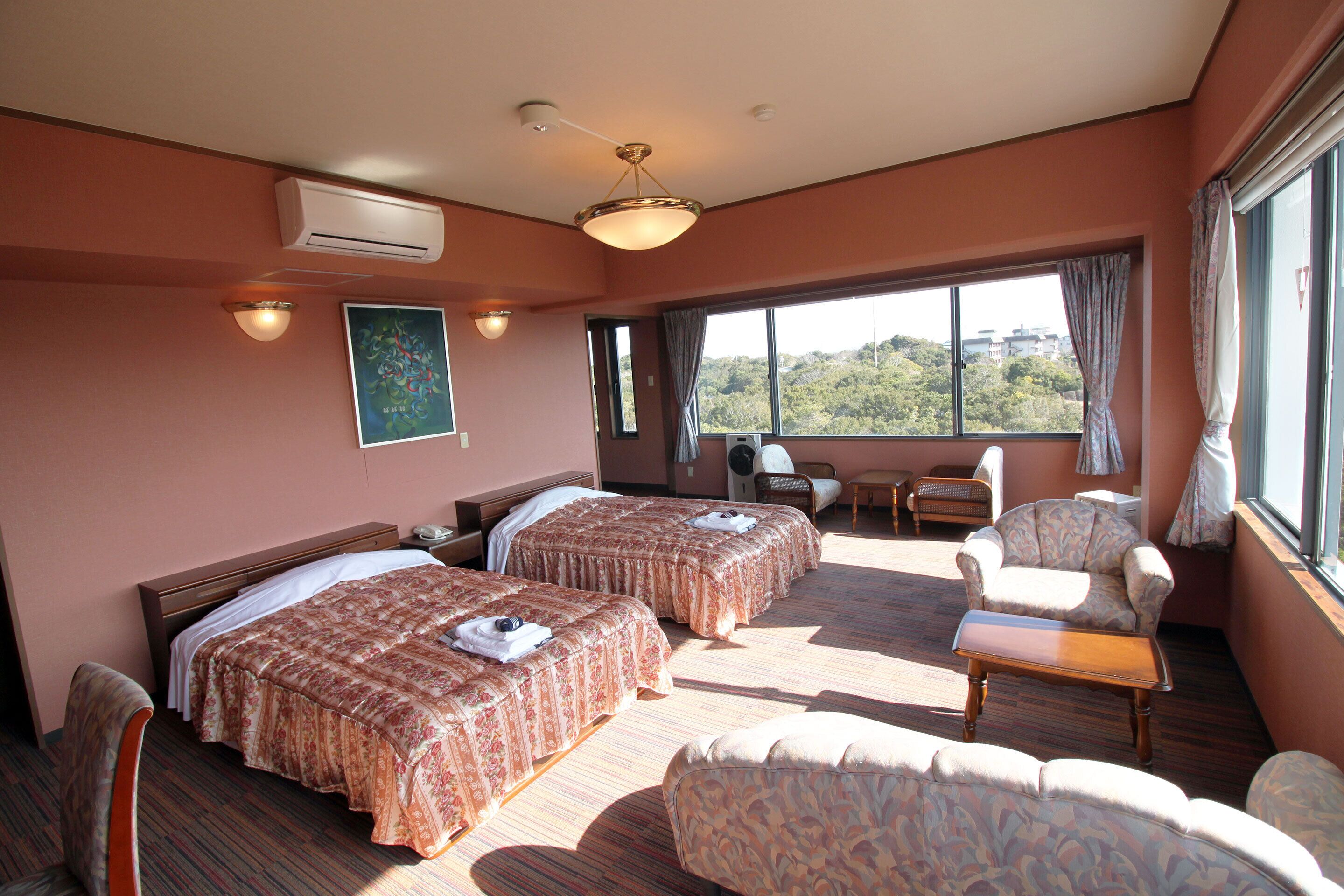 deluxe twin room, sea view | 1 bedroom, in-room safe, iron/ironing board