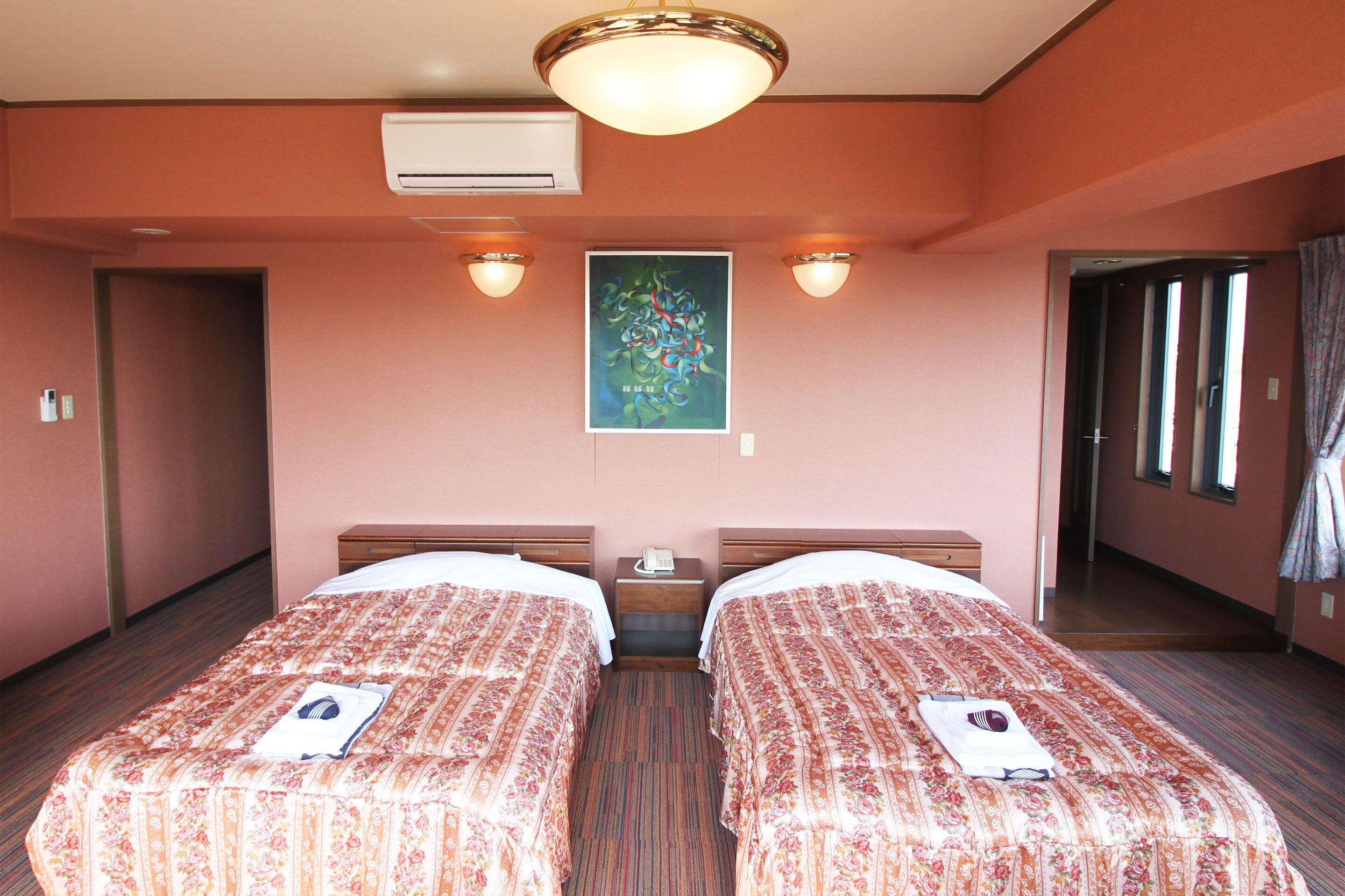 deluxe twin room, sea view | 1 bedroom, in-room safe, iron/ironing board