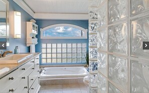 Combined shower/tub, hair dryer, towels, soap