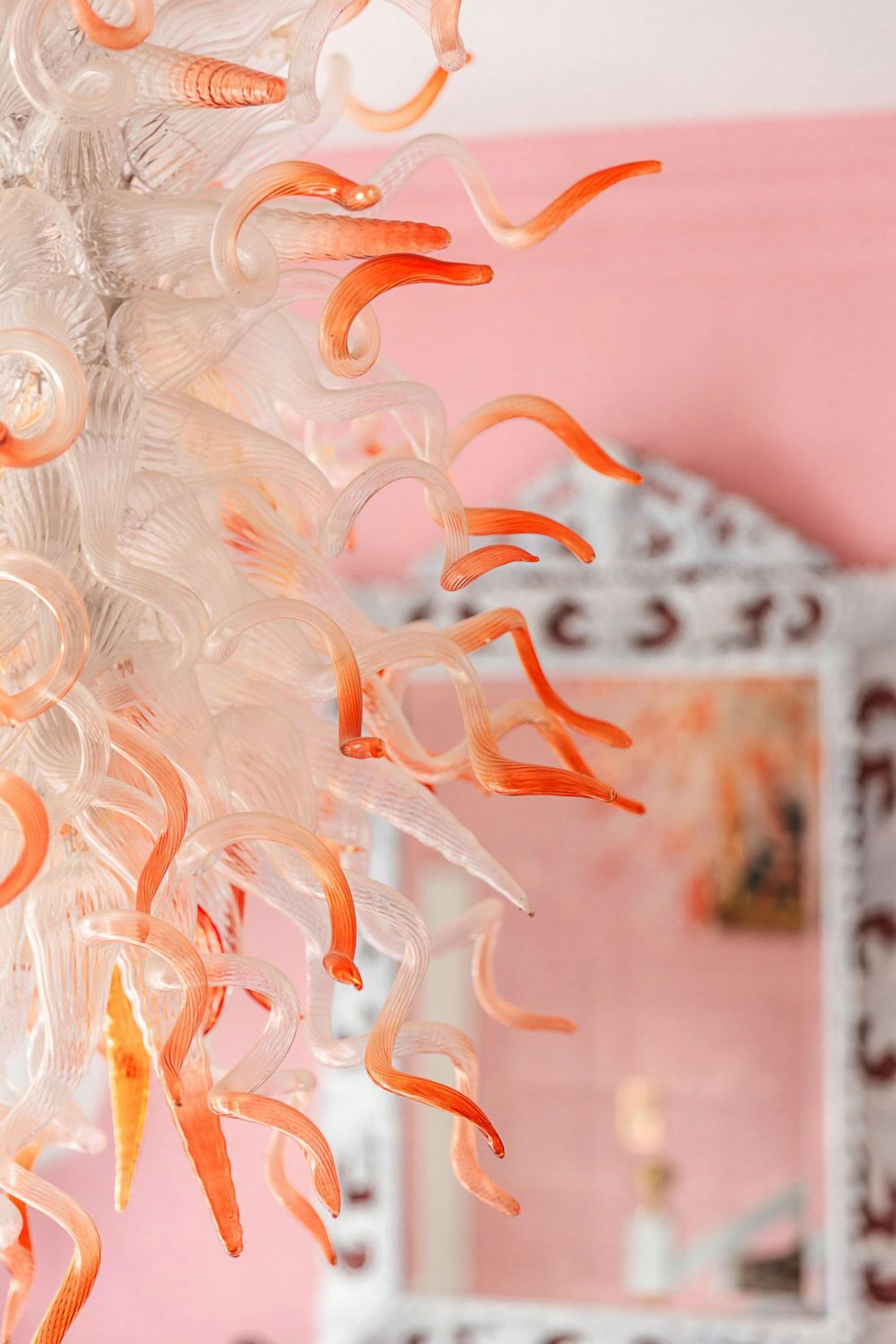 A chandelier with multiple glass elements.