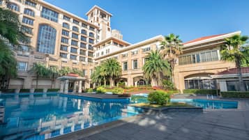 Outdoor pool, open 8:00 AM to 10:00 PM, pool umbrellas