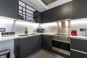 Apartment | Private kitchen | Fridge, microwave, oven, stovetop