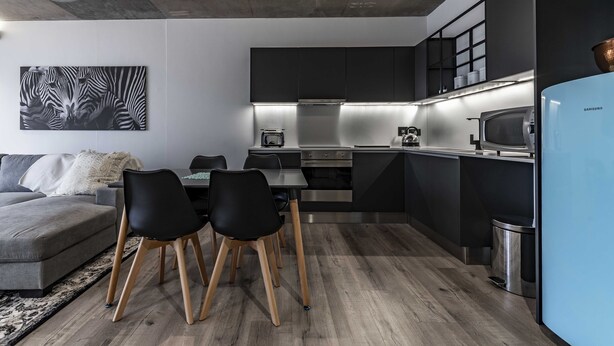 Apartment | Living area | Flat-screen TV - 106 The Signature De Waterkant (Cape Town)