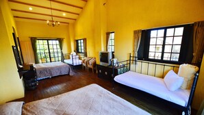 A room with two beds, a television, and a window with curtains. - Nuowei Senlin Cottage (Ren'ai)