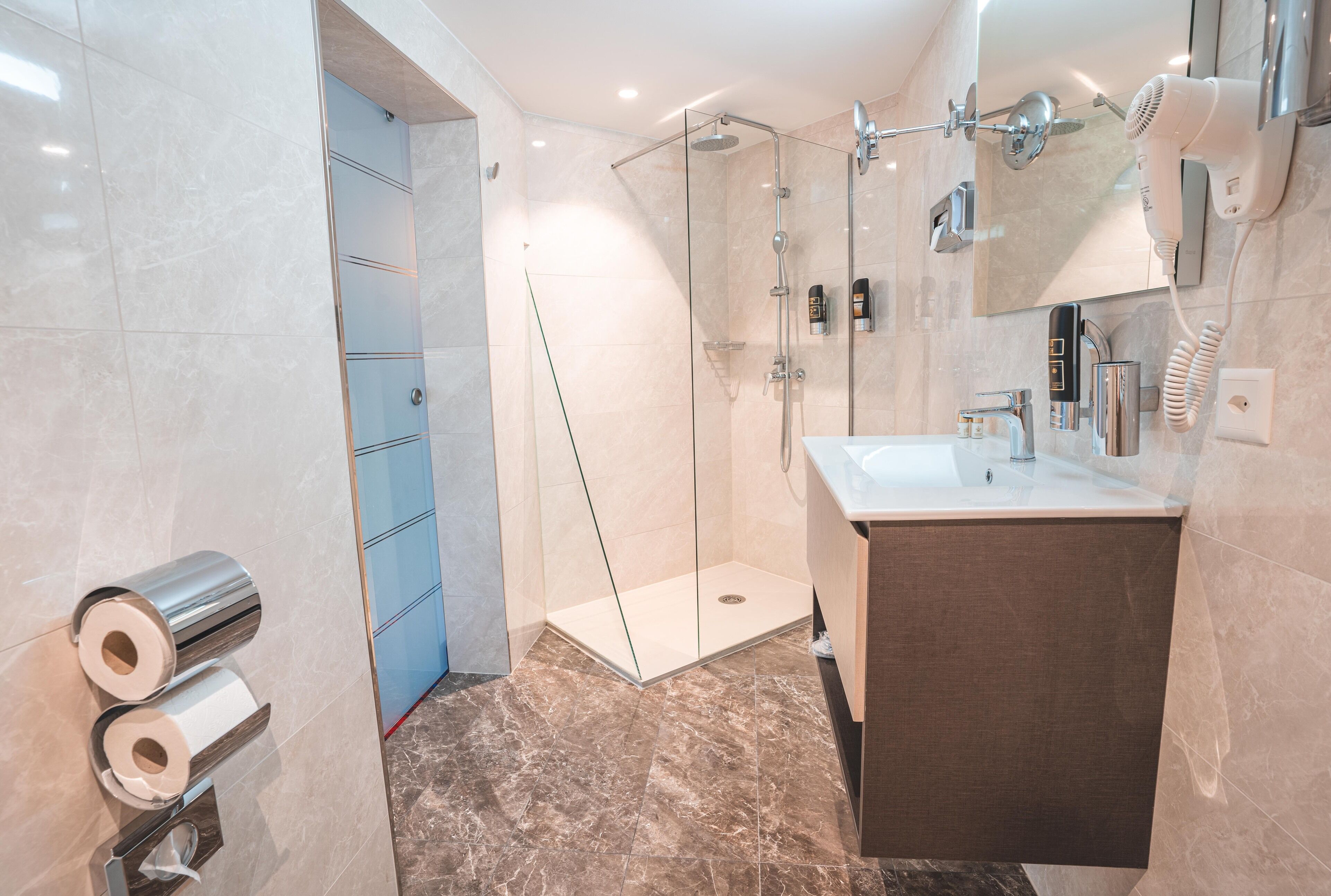 standard triple room | bathroom | shower, rainfall showerhead, hair dryer, towels