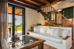 Premium Villa, 2 Bedrooms, Sea View | Living room | 32-inch flat-screen TV with cable channels, TV - Alekata-Traditional Villas of Kefalonia (Kefalonia)