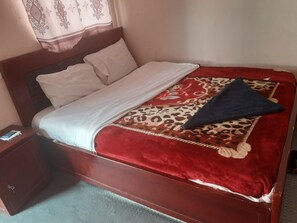 Desk, blackout curtains, rollaway beds, free WiFi