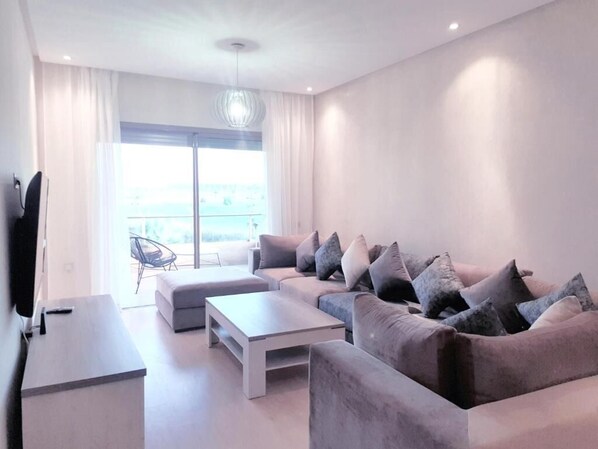 Luxury Apartment, 2 Bedrooms, Golf View | Living room | 46-inch LCD TV with satellite channels, TV