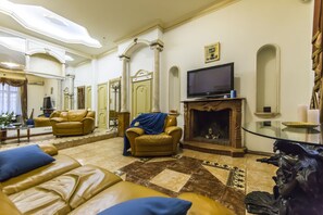 Apartment, 1 Bedroom | Living room | Flat-screen TV