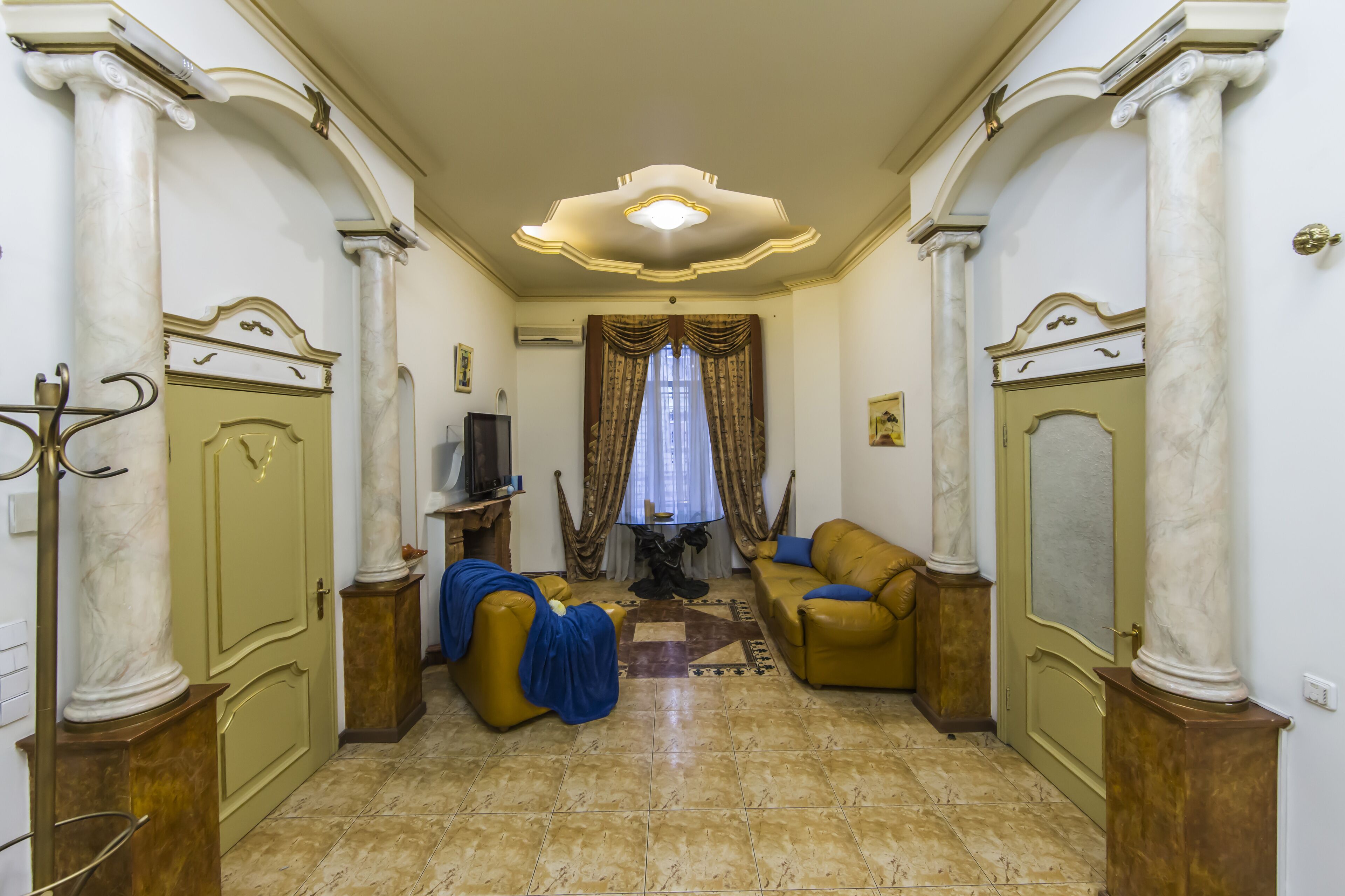 Apartamento, 1 quarto | Sala de estar | TV de tela plana