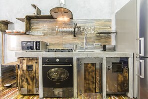 Luxury Apartment | Private kitchen | Full-size fridge, microwave, stovetop, cookware/dishes/utensils