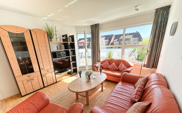 Una televisión, un reproductor estéreo