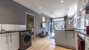 Apartment, 2 Bedrooms | Private kitchen | Fridge, microwave, oven, stovetop - C501 Woodstock Quarters Funky Apartment. (Cape Town)