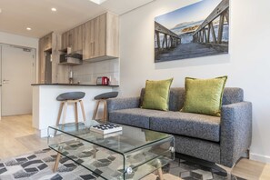 Apartment, 2 Bedrooms | Living room | Smart TV, Netflix, streaming services - C504 Woodstock Quarters Gym and Pool (Cape Town)