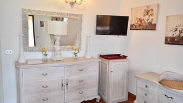 Apartment, 1 Bedroom | Living area | 32-inch flat-screen TV with digital channels, TV