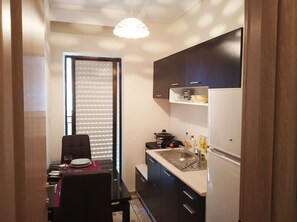 Appartamento Superior | Angolo cottura privato | Frigorifero, forno, piano cottura, bollitore elettrico