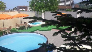 Seasonal outdoor pool, open 8:00 AM to 8:00 PM, pool umbrellas - Charodeika Guest House (Sochi)