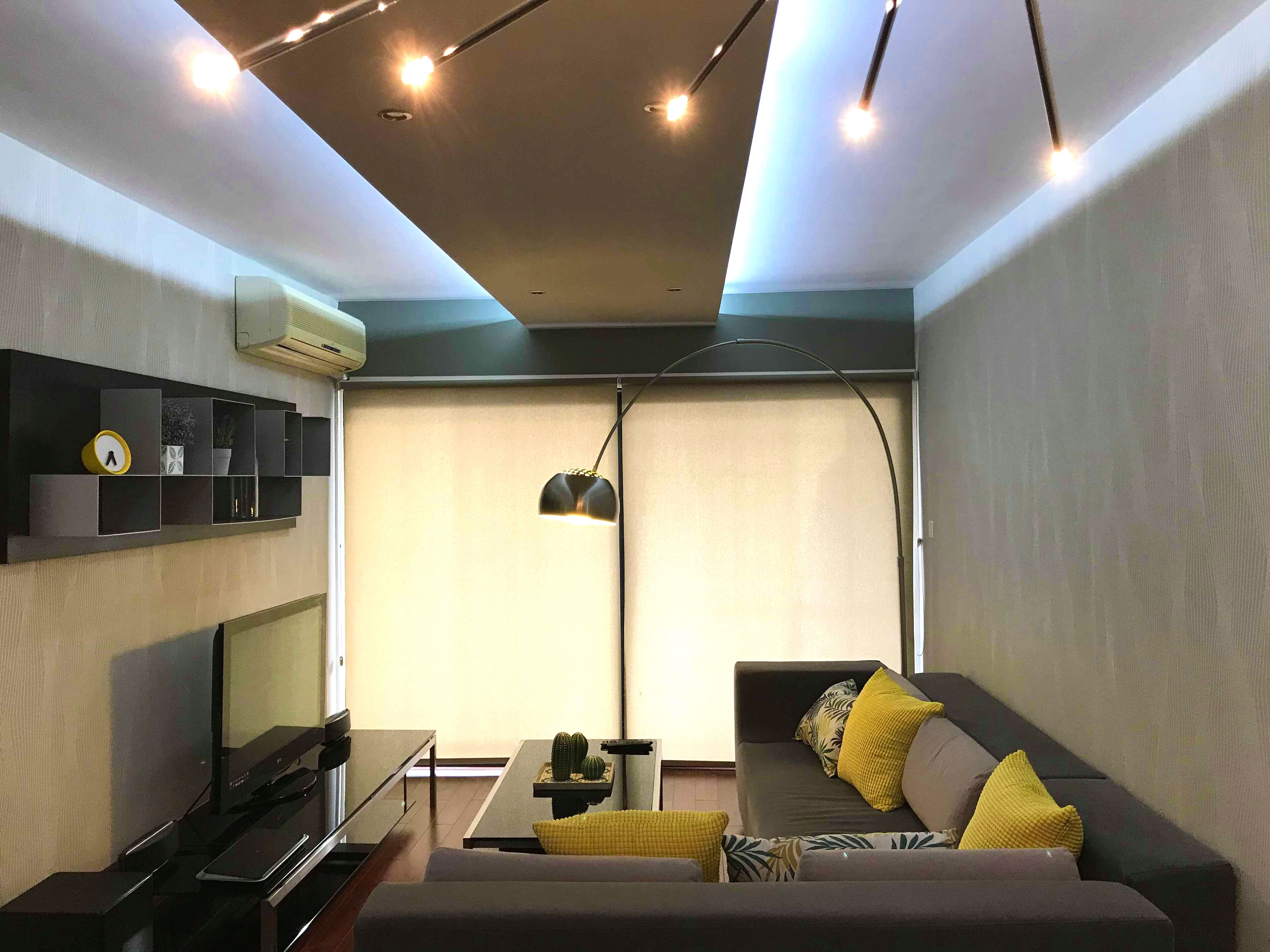 Apartamento urbano, 1 cama Queen e sofá-cama, para não fumantes, vista para a cidade | Sala de estar | TV LCD 42 polegadas com canais a cabo, TV, dock para MP3