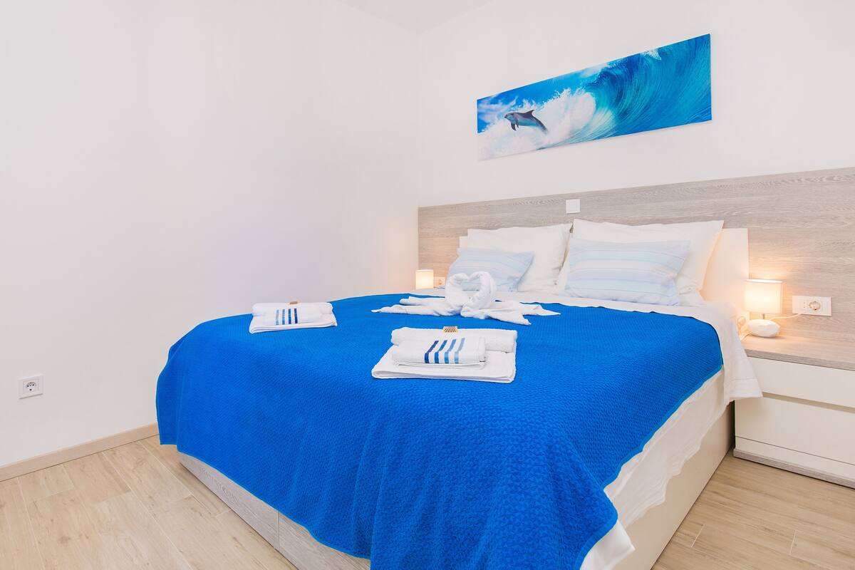Down comforters, desk, WiFi (free), bed sheets