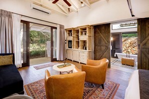 Deluxe Room, 1 King Bed (Forest View) | Minibar, in-room safe, desk, laptop workspace