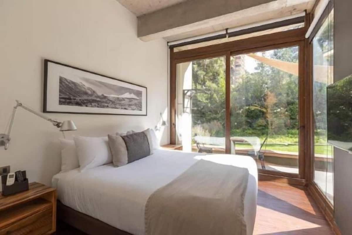 Hypo-allergenic bedding, down duvets, in-room safe