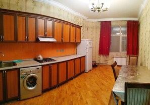 Apartment, 1 Bedroom | Private kitchen | Full-size fridge, stovetop, cookware/dishes/utensils - Bakuvi Tourist Apartment B015 (Baku)