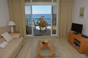 Panoramic Apartment, 2 Bedrooms | Living room | Flat-screen TV - Atlantic view 1 - Apartment with ocean view & pool (Funchal)