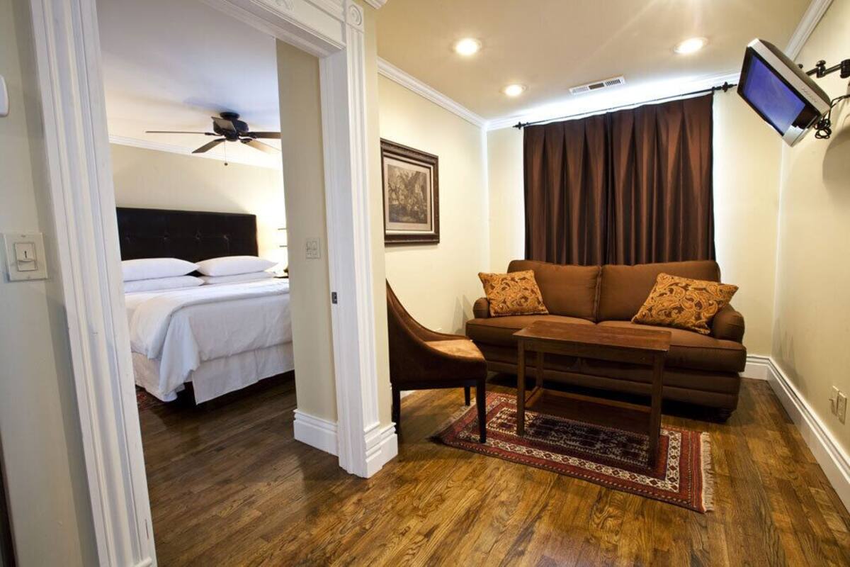Deluxe Room | Blackout drapes, iron/ironing board, WiFi (free), bed sheets
